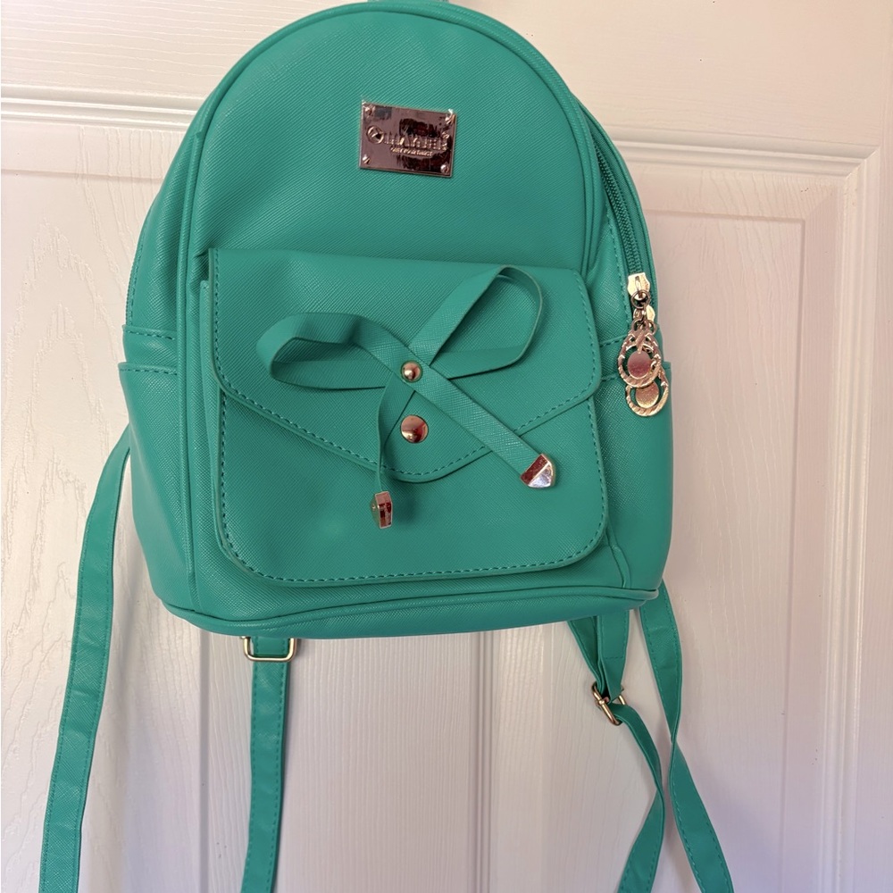IHAYNER GIRLS MINI BACKPACK green with bow on front! Excellent shape!